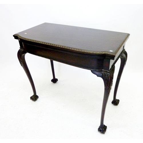 1249 - A mahogany Chippendale style fold top card table