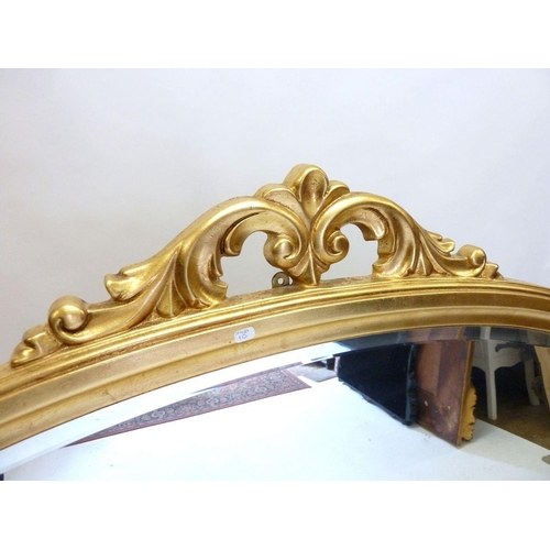 1250A - A large gilt overmantel mirror, 104cm high x 145cm wide