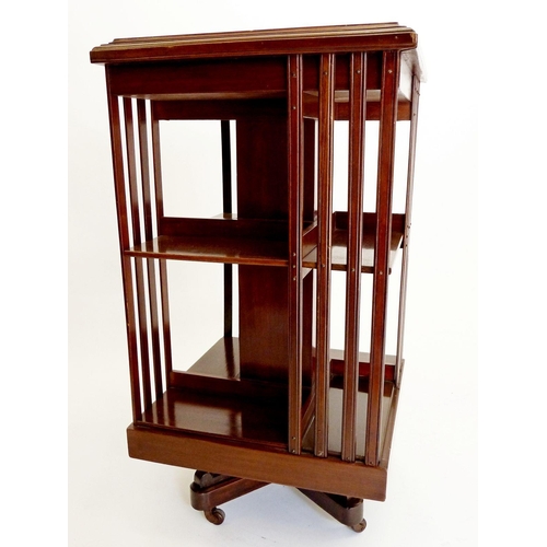 1256 - An Edwardian mahogany revolving bookcase, 89 x 49cm