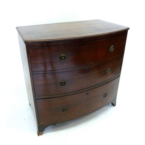 1258 - A 19th century bow fronted chest of three drawers, 92cm wide