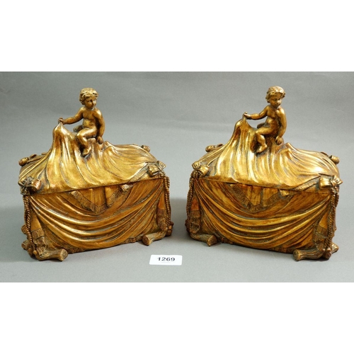 1269 - Two gilt composition boxes surmounted by cherubs, 18 x 10 x 20cm