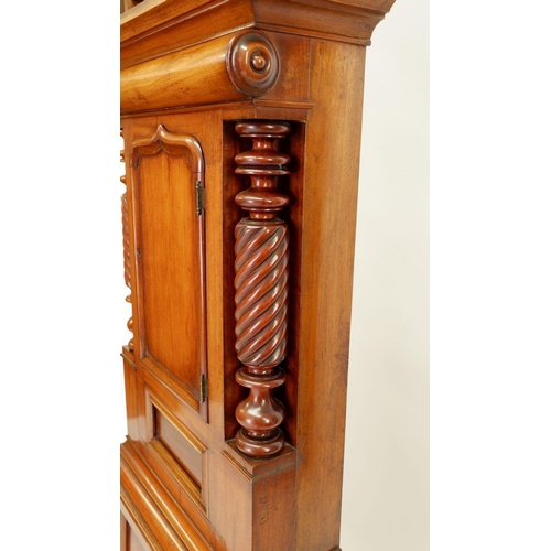 1272 - A Victorian mahogany longcase clock with swan neck pediment over carved wrythen spiral supports flan... 