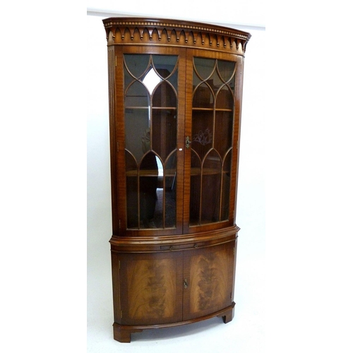 1277 - A mahogany reproduction corner cabinet with two glazed doors, 188cm high