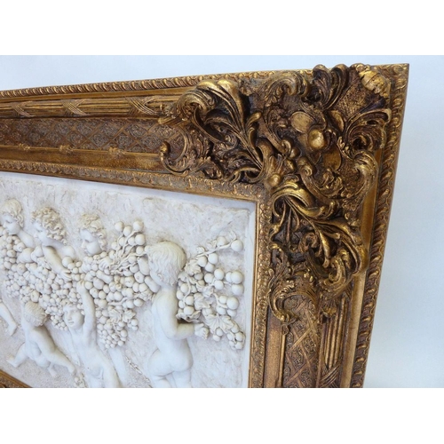 1280 - A very large Parian style panel picture depicting cherubs in heavy gilt frame, 94 x 102cm