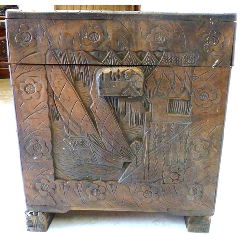 1283 - A carved Chinese camphorwood chest