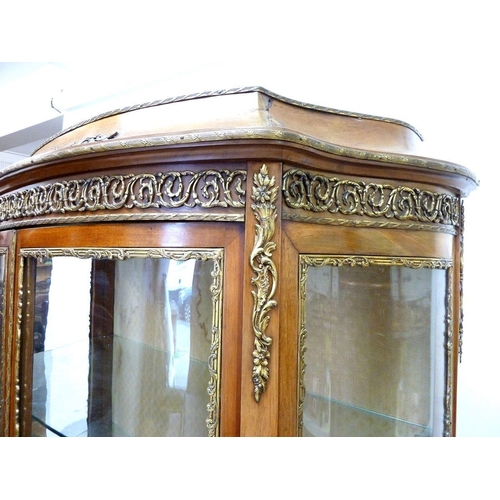 1293 - A French Vernis Martin two door glazed cabinet with gilt metal mounts and painted panels, approx 168... 