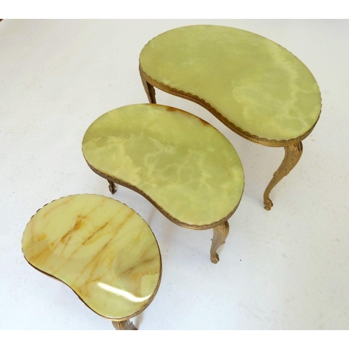 1305 - An onyx and gilt metal coffee table (overall length 117cm) and a nest of tables