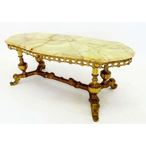 1305 - An onyx and gilt metal coffee table (overall length 117cm) and a nest of tables