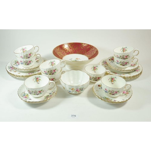 376 - A Minton Marlow tea service comprising: nine cups and eight saucers, sugar bowl, six tea plates and ... 