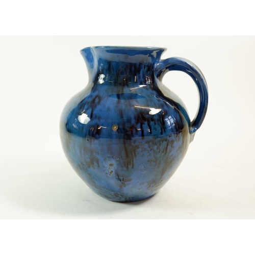 414 - A studio pottery large blue jug, signed to base