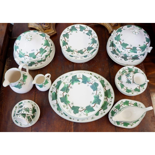 440 - A Wedgwood Napoleon Ivy dinner service comprising: two vegetable dishes with lids, one carving dish,... 