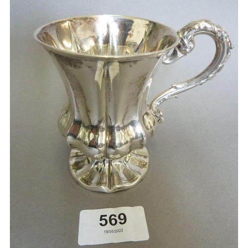 569 - A Victorian silver Mappin & Webb christening mug of reeded and waisted form, Sheffield 1851, 114g, 9... 