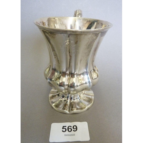 569 - A Victorian silver Mappin & Webb christening mug of reeded and waisted form, Sheffield 1851, 114g, 9... 