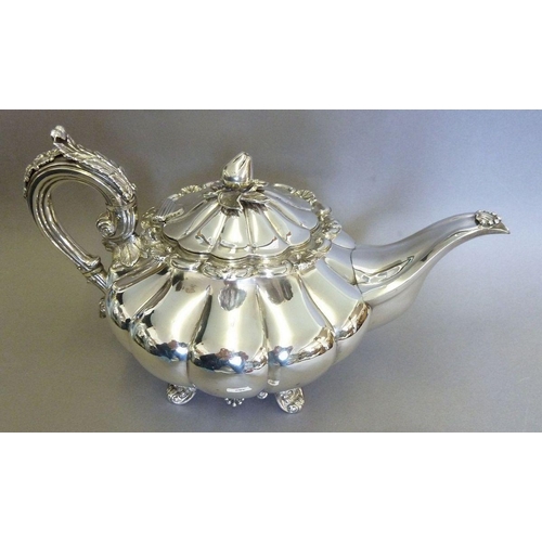 586 - An Irish silver teapot of melon form with fruit finial, Dublin 1839 by Robert Smith 865g