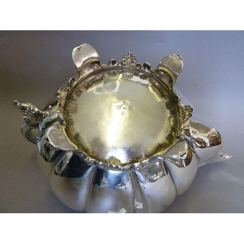 586 - An Irish silver teapot of melon form with fruit finial, Dublin 1839 by Robert Smith 865g