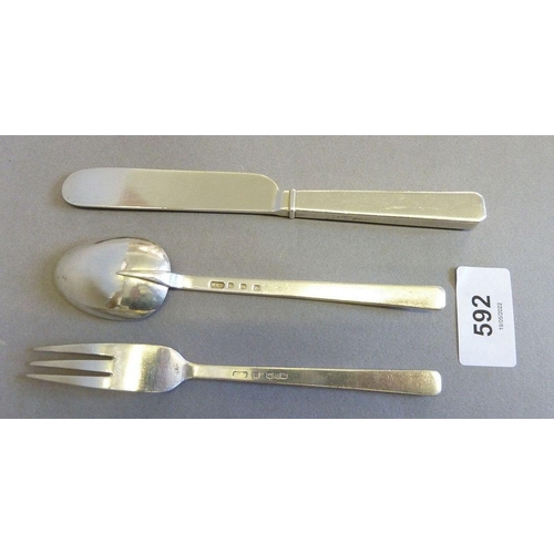 592 - A silver three piece christening cutlery set cast 'Thomas', London 1938, 115g