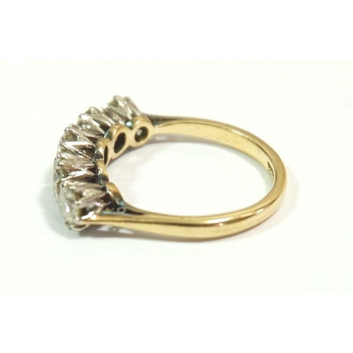 600 - An 18 carat gold and platinum set five stone diamond ring, approx 1.4 carats of diamonds, size M, 3.... 