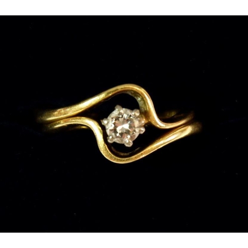 611 - A 1970's 18 carat gold interlinking wedding ring and engagement solitaire diamond ring, size K, 4.2g... 