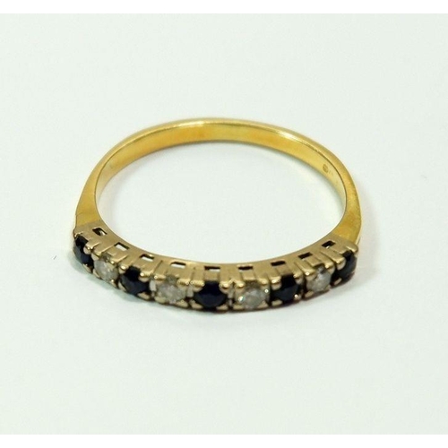 613 - A gold ring line set sapphires and diamonds (marks rubbed) size O, 2.2g