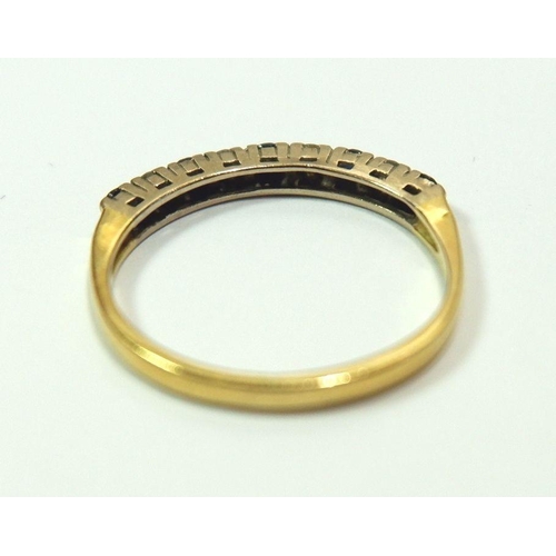 613 - A gold ring line set sapphires and diamonds (marks rubbed) size O, 2.2g