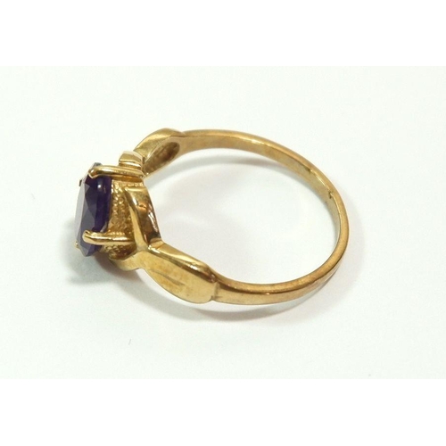 626 - A 9 carat gold ring set oval cut amethyst, size L, 1.9g