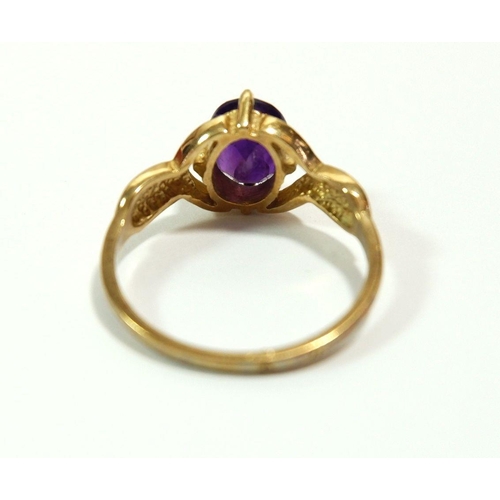 626 - A 9 carat gold ring set oval cut amethyst, size L, 1.9g