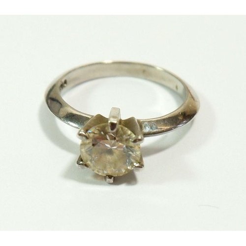 632 - A white metal ring set solitaire white stone, size H to I