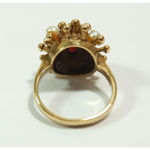 640 - A 9 carat gold vintage dome ring set garnets and pearls, size H, 4.5g