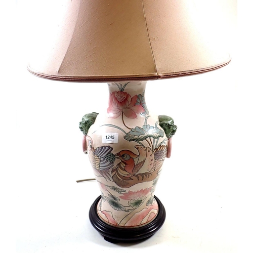 1245 - A Chinese table lamp painted exotic birds and lillies, 45cm high