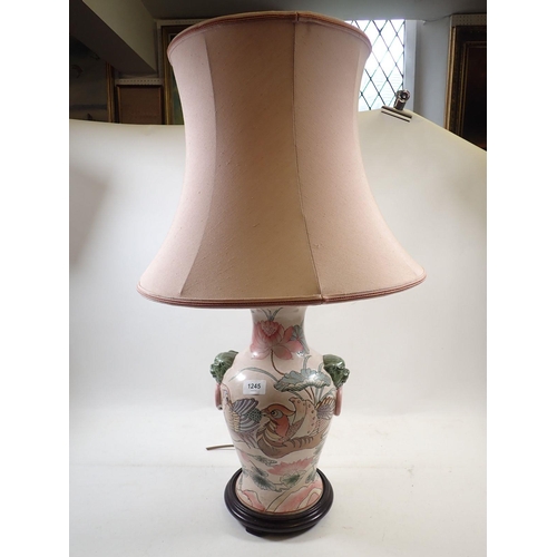 1245 - A Chinese table lamp painted exotic birds and lillies, 45cm high