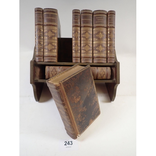 243 - An Asprey small reference library on bookstand including Dictionary, Atlas, Gazetteer, Quotations & ... 