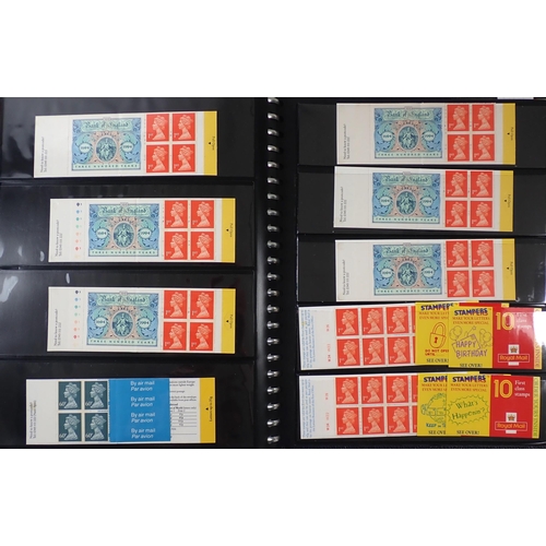 110 - GB: Two black stock-books QEII decimal defin/commem largely in booklets and Royal Mail 