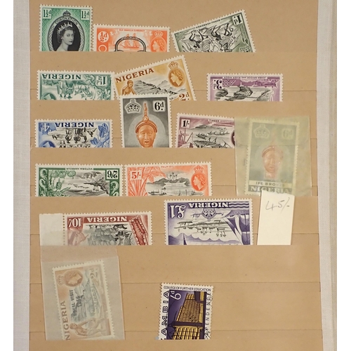 114 - GB & Br Empire/C'wealth: Boxed maroon stamp stock-book of mainly mint defin & commem issues incl set... 