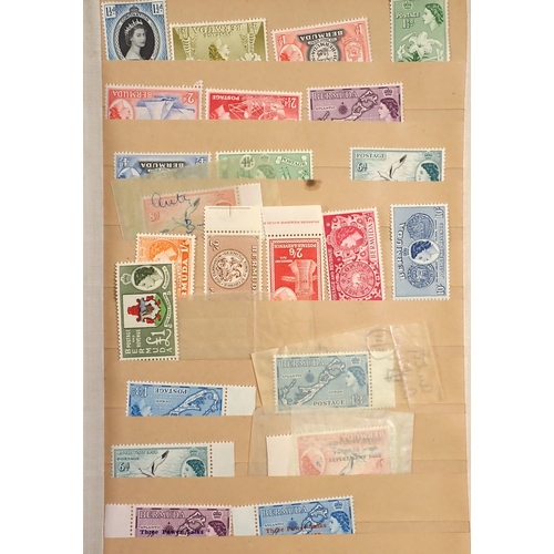 114 - GB & Br Empire/C'wealth: Boxed maroon stamp stock-book of mainly mint defin & commem issues incl set... 