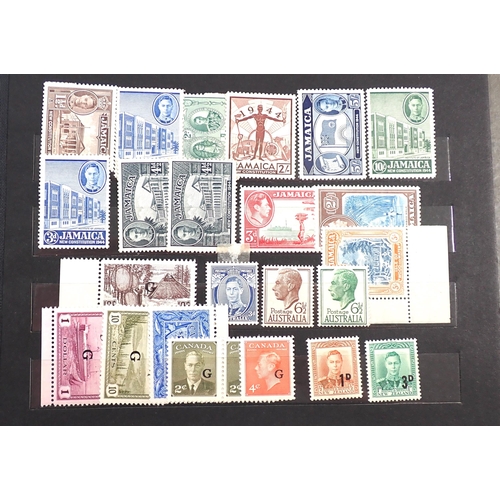 115 - Br Empire/C'wealth: Small maroon stock-book of mainly mint KGVI stamps, some in sets/part-sets to th... 