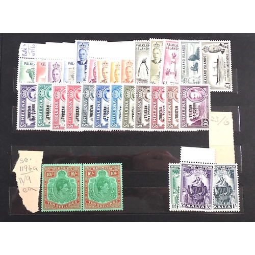 115 - Br Empire/C'wealth: Small maroon stock-book of mainly mint KGVI stamps, some in sets/part-sets to th... 