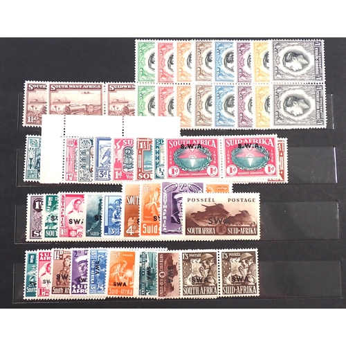 115 - Br Empire/C'wealth: Small maroon stock-book of mainly mint KGVI stamps, some in sets/part-sets to th... 