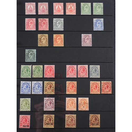 165 - Turks & Caicos Is: Black 14 page Hagner album of QV-QEII defin & commem. Wmk, overprint & other vari... 