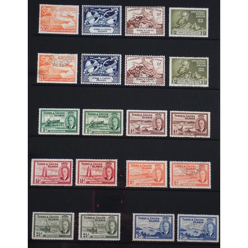 165 - Turks & Caicos Is: Black 14 page Hagner album of QV-QEII defin & commem. Wmk, overprint & other vari... 