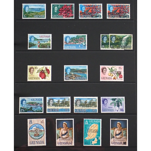 166 - Grenada: Mint & used QV-QEII 23 page collection in Hagner album. Defin, commem, postage due, fiscal ... 