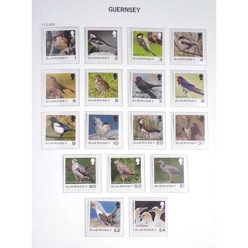 75 - GB-Channel Islands: 3 high quality purposed Davo/SG stamp albums full of mint defin, commem & postag... 