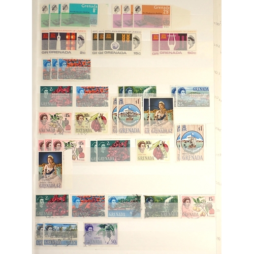 86 - Grenada/Grenadines: Boxed collection of 4 stock-books of mint/used defin & commem; KGVI/QEII, mostly... 