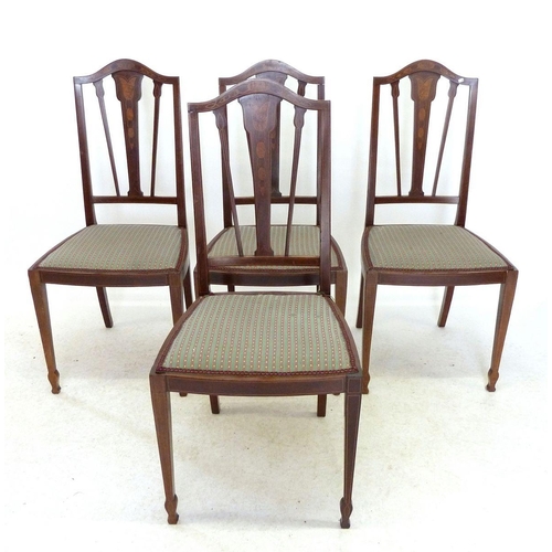 1003 - A set of four Edwardian mahogany salon chairs with marquetry decoration