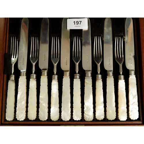 197 - A boxed set of twelve pairs of silver fruit knives and forks with mother of pearl handles, Sheffield... 