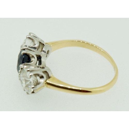 237 - A fine 18 carat gold ring set central sapphire (1.99ct) flanked by two diamonds (85pts each) size O,... 