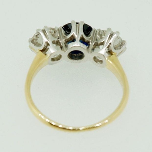 237 - A fine 18 carat gold ring set central sapphire (1.99ct) flanked by two diamonds (85pts each) size O,... 