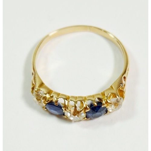 238 - An 18 carat gold five stone sapphire and diamond ring (approx. total 1.5cts diamonds), size R, 4g