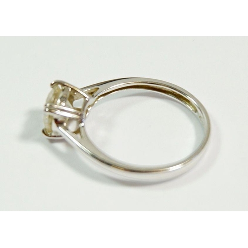 242 - A 14 carat white gold ring set cubic zirconium, size I