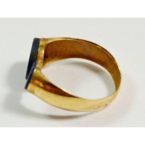 244 - A gold ring set lapis lazuli, unmarked, size H, 3.6g