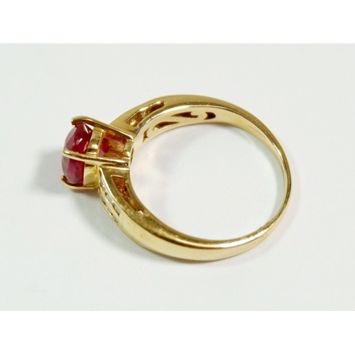 250 - A 14 carat gold ring set ruby on diamond set shoulders,